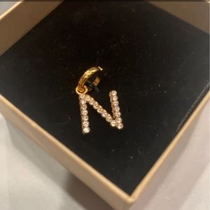 Burberry N Gold plated pendant embellished with Crystal Stone